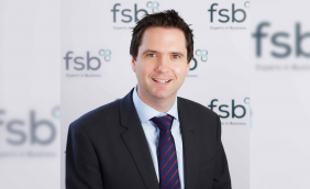 Apprentices working on a car.png